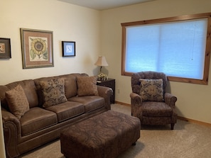 Secondary living area with pull out couch and TV!