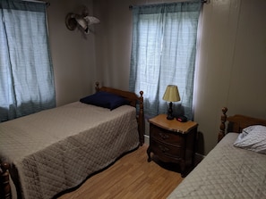 Front bedroom. Two twin beds.