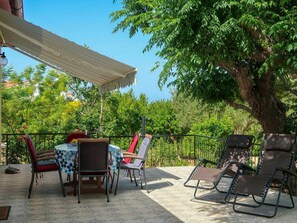 Furniture, Sky, Property, Plant, Chair, Building, Nature, Shade, Table, Outdoor Table