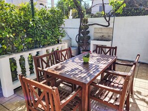 Table, Plant, Property, Furniture, Outdoor Table, Chair, Wood, Outdoor Furniture, Interior Design, Porch