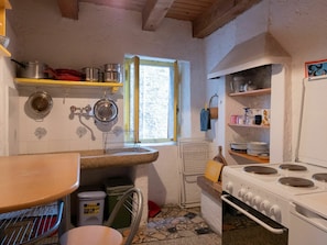 Property, Countertop, Cabinetry, Kitchen, Sink, Kitchen Appliance, Kitchen Stove, Home Appliance, Wood, Plumbing Fixture