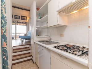 Countertop, Cabinetry, Building, Gas Stove, Kitchen Appliance, Kitchen Stove, Exhaust Hood, Cooktop, Kitchen, Wood