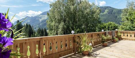 Cloud, Sky, Plant, Property, Mountain, Wood, Fence, Tree, Outdoor Furniture, Natural Landscape