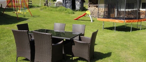 Property, Plant, Table, Building, Shade, Land Lot, Tree, Outdoor Table, Outdoor Furniture, Chair