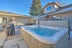 Take advantage of this vacation rental's hot tub.