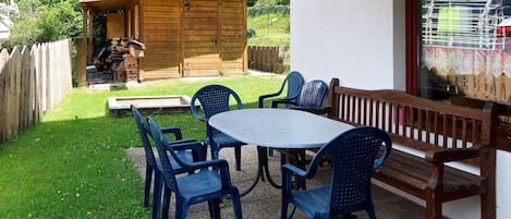 Furniture, Property, Plant, Building, Table, Window, Tree, Shade, Wood, Chair