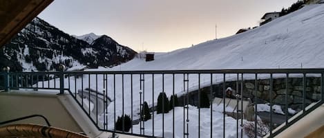 Sky, Property, Snow, Mountain, Fence, Wood, Tree, House, Building, Shade