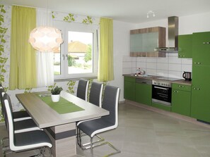Green, Room, Furniture, Interior Design, Property, Floor, Building, Kitchen, Table, Wall