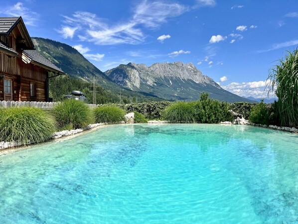 Water, Cloud, Sky, Plant, Water Resources, Daytime, Mountain, Natural Landscape, Azure, Swimming Pool