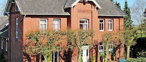 Plant, Sky, Building, Property, Window, Tree, House, Land Lot, Cottage, Grass