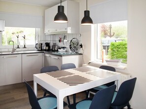 Furniture, Table, Countertop, Cabinetry, Property, Chair, Kitchen, Lighting, Wood, Interior Design