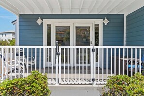 Private deck STEPS AWAY from the Gulf.