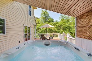 Covered private hot tub on back deck