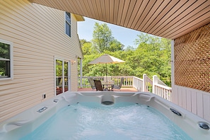 Covered private hot tub on back deck