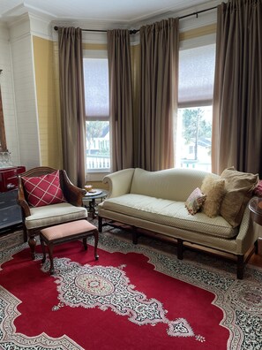 Large sitting area in suite.