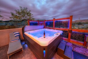 Come experience our private hot tub with sculpted seating for 7!