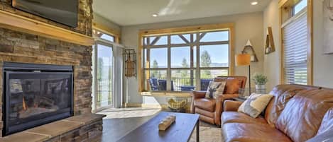 The inviting living room offers endless views our the large window