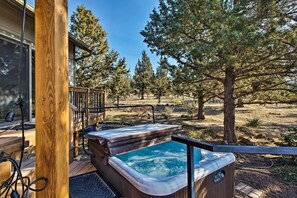 Soak sore hiking muscles in the private hot tub.