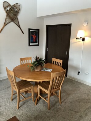 Nice oak table with 4 chairs. There is an additional 5th chair in closet.