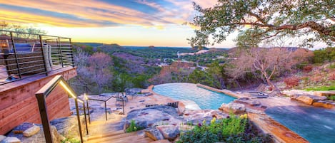 Relax and enjoy the view from our outdoor hot tub and the gorgeous pool!