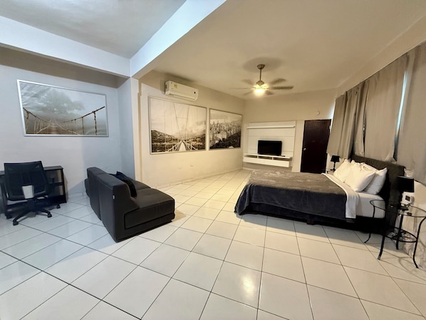 Roomy with queen bed and sitting, working and entertaining areas