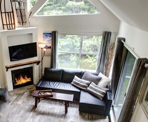 The coffee tables doubles as a bench seat when the dining table is extended
