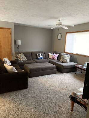 New sectional and sofa. Plenty of seating for all. Smart TV and DVD player.