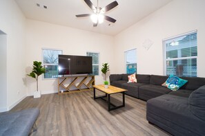 Living room | 75in Smart TV | Central A/C & Heating | Free WiFi