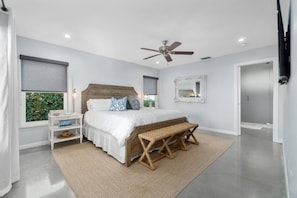 The spacious master bedroom with king bed is a wonderful retreat complete with a walkout the pool and incredible views.