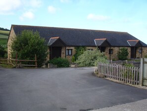 Ash Cottage front entrance. Parking is to the right, past the cottages. 