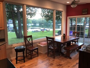 Large Dining area with scenic lake view.