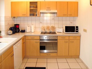 Cabinetry, Kitchen, Room, Furniture, Countertop, Property, Kitchen Stove, Interior Design, Cupboard, Major Appliance