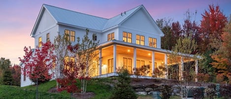 Side & Front View of house at during Fall Sunset