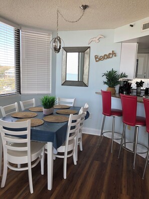 Dining Area with 6 chairs plus 3 bar stools