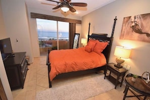 Second bedroom with queen bed and TV