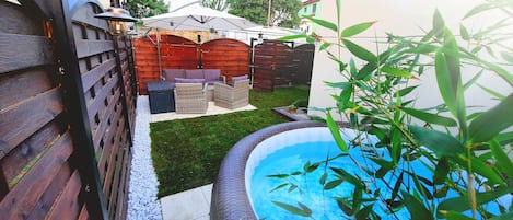 Private garden with hot tube