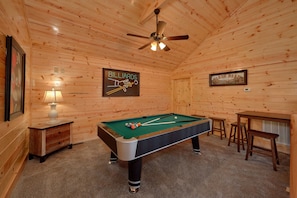Gameroom with a pool table