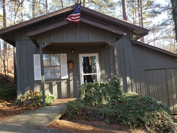 our one bedroom cottage is cozy with fireplace and flat screen TV in living room