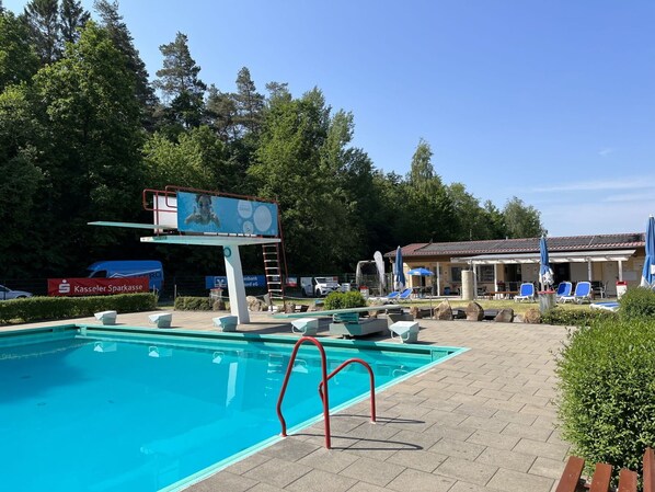 Water, Plant, Property, Sky, Swimming Pool, Azure, Shade, Outdoor Furniture, Tree, Building