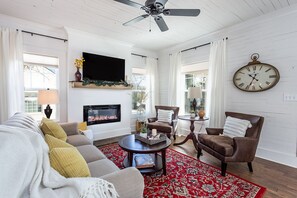 Living room with great light, TV, fireplace