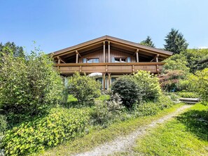 Plant, Sky, Natural Landscape, Shade, Land Lot, Tree, Wood, Building, Grass, Groundcover