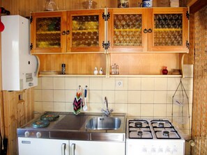 Kitchen, Room, Countertop, Cabinetry, Property, Tile, Furniture, Sink, Interior Design, House