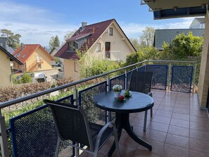 Plant, Sky, Building, Daytime, Property, Table, Cloud, Flowerpot, Tree, Chair