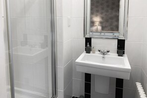 On suite shower and hand basin located in master bedroom. No toilet ensuite.