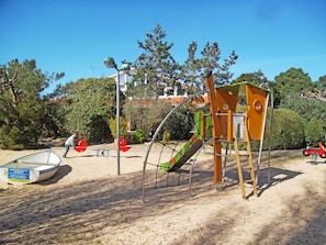 Playground, Public Space, Outdoor Play Equipment, Human Settlement, Playground Slide, City, Swing, Recreation, Tree, Sky