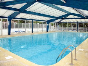 Water, Swimming Pool, Building, Azure, Shade, Leisure, Aqua, Composite Material, Real Estate, Resort Town