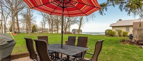 Patio with Lake Erie views - only 30 yards from the back door is a small beach.