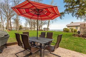 Enjoy grilling and taking in the views from the back patio.  Views of the lake can be seen and the ability to watch the kiddos at the adjacent playground/park.