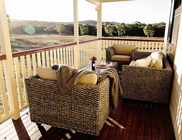 Expansive front verandah - perfect for watching the sunset with a glass of wine