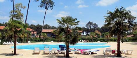 Cloud, Water, Sky, Property, Plant, Tree, Swimming Pool, Outdoor Furniture, Shade, Arecales